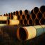 Miles of unused pipe, prepared for the proposed Keystone XL pipeline, sit in a lot on Oct. 14, 2014 outside Gascoyne, North Dakota. Credit: Andrew Burton/Getty Images