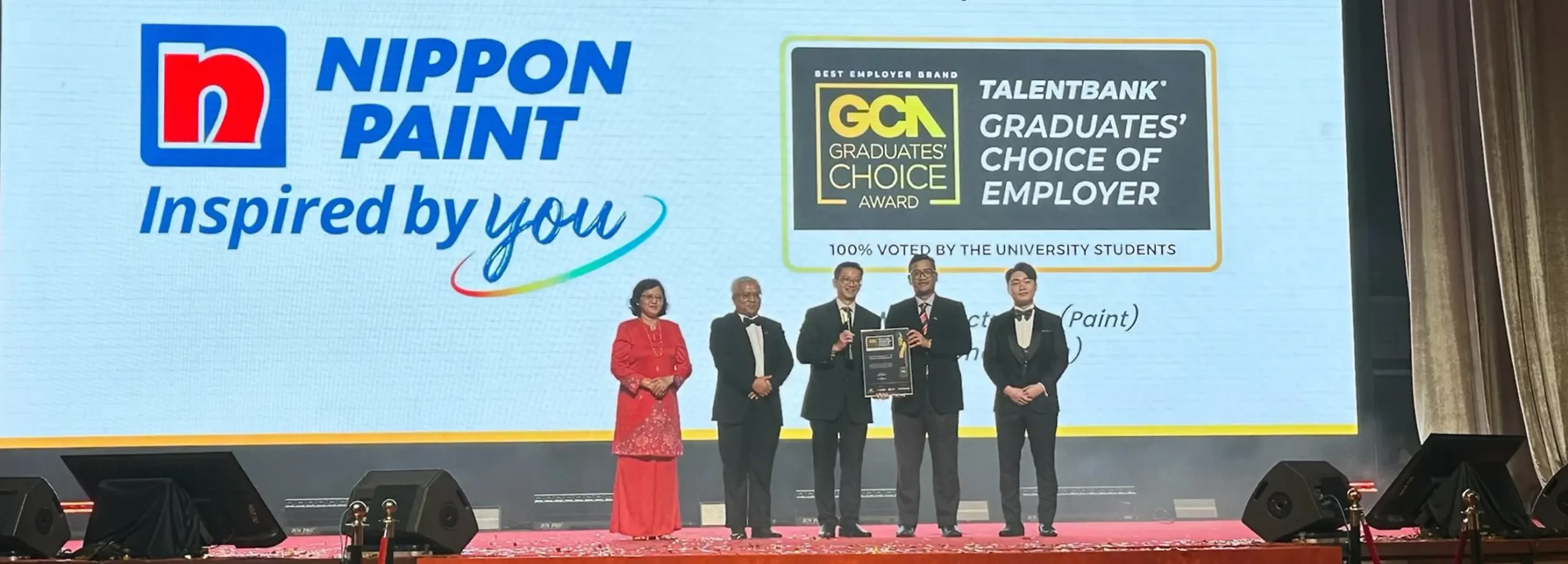 Nippon Paint team celebrating the Graduates' Choice Employer Award, showcasing their commitment to inspiring young professionals. The event highlights Nippon Paint's recognition as a top employer voted by university students.